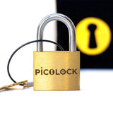 The PicoLock pocket-sized puzzle lock shown with its included fabric carrying bag.