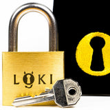 The Loki brass puzzle lock by Puzzlocks on a black background with the yellow Puzzlocks keyhole logo