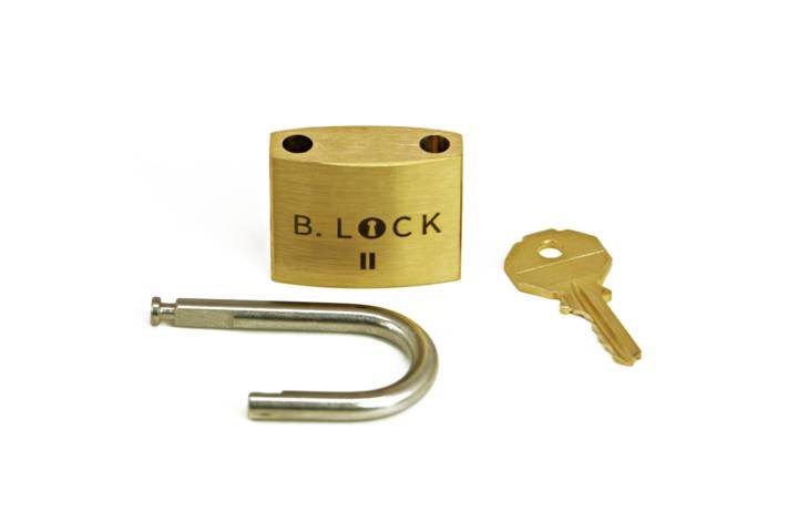 The B-Lock II puzzle shown completely solved with the shackle removed. This beginner trick lock requires uncovering a clever internal maze, making it a great physical problem-solving task for first-time owners.
